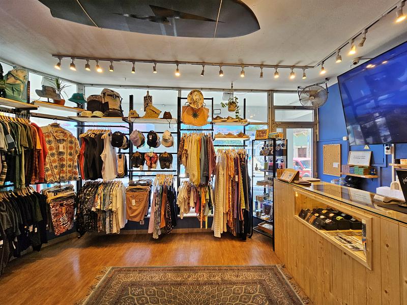 view of a Jah Shaka Surf Shop with a large screen tv