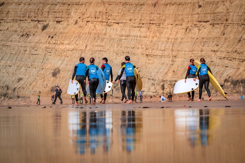 A group surf lesson on the beach