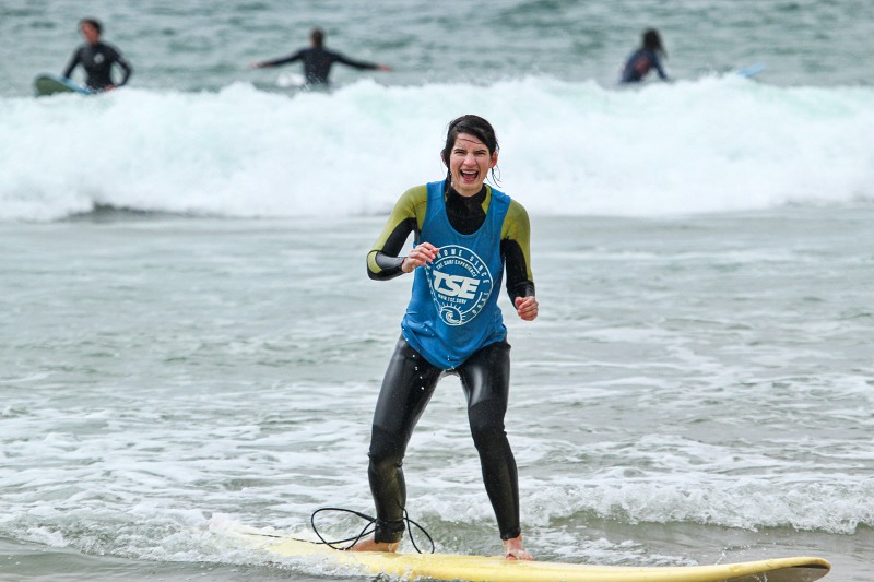 a woman learning to surf