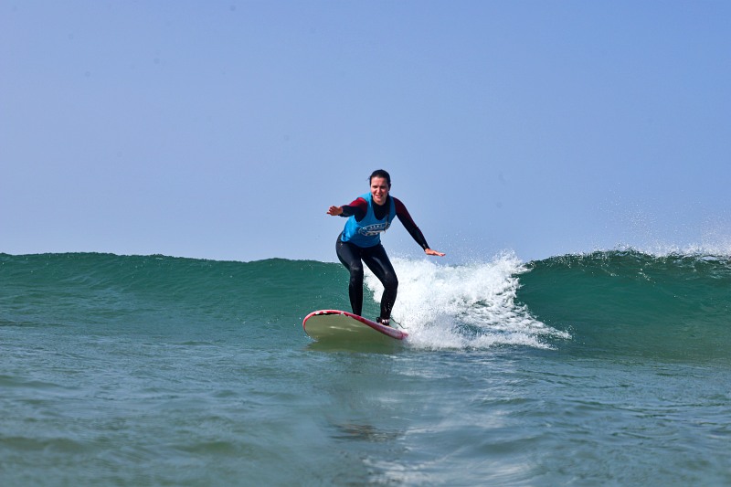 A woman having a surf lesson in Lagos